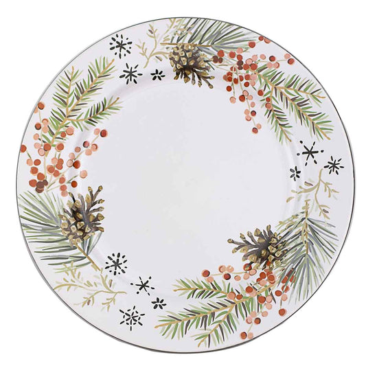 Decorative plate with winter-themed design featuring pine branches, berries, and snowflakes on a white background.