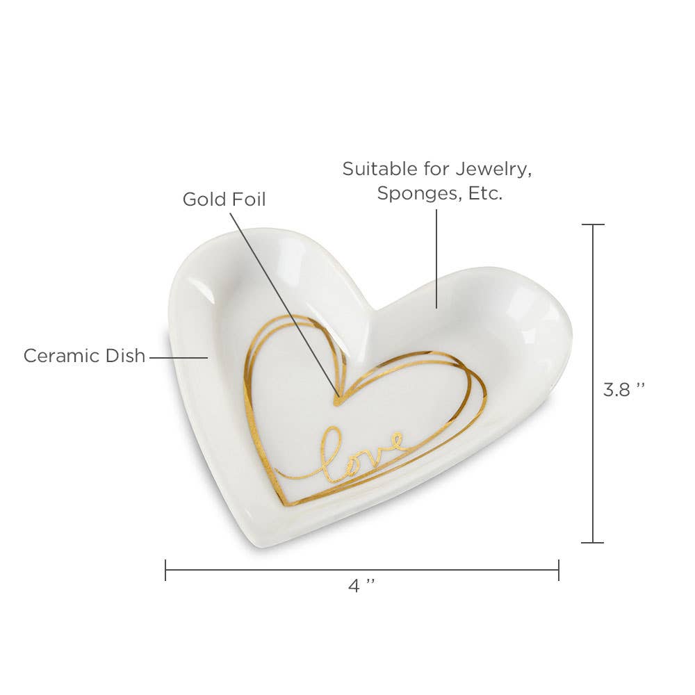 Heart-shaped ceramic dish with gold foil details and measurements on a white background